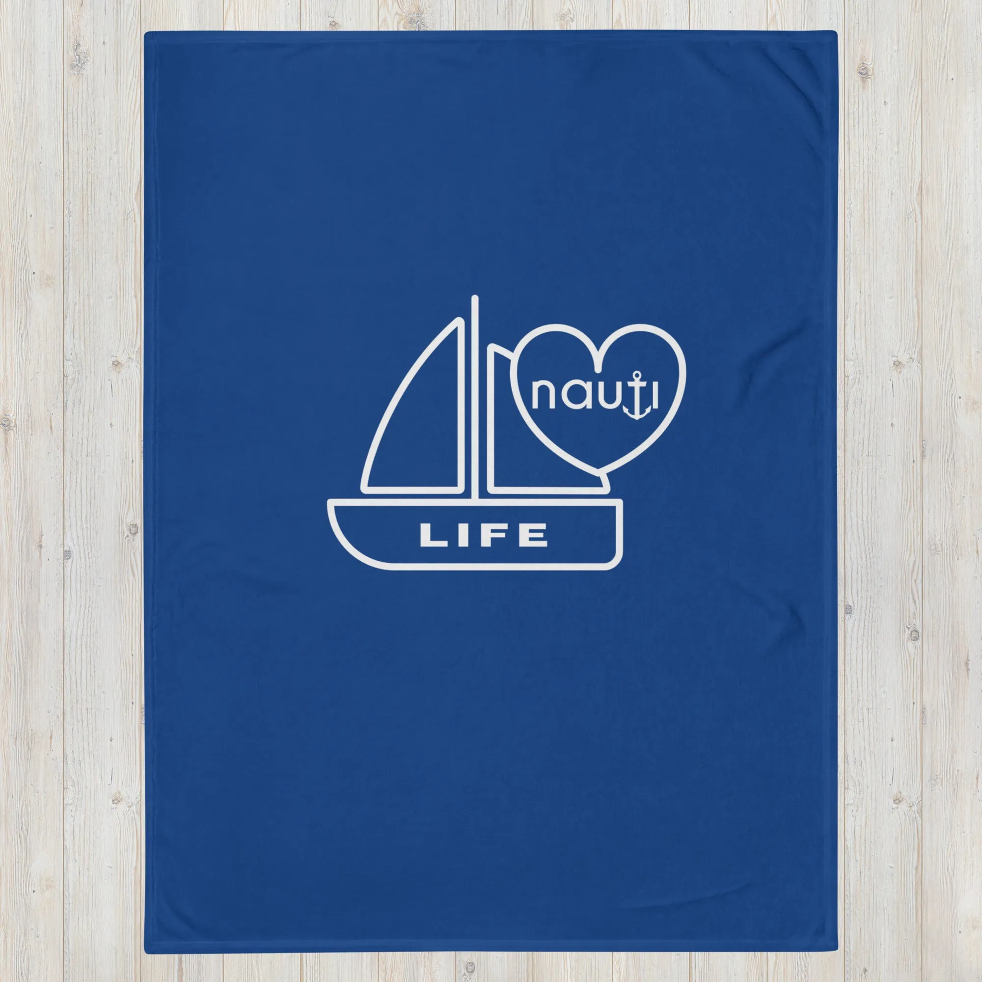 "NAUTI" boat life blanket in navy with white logo