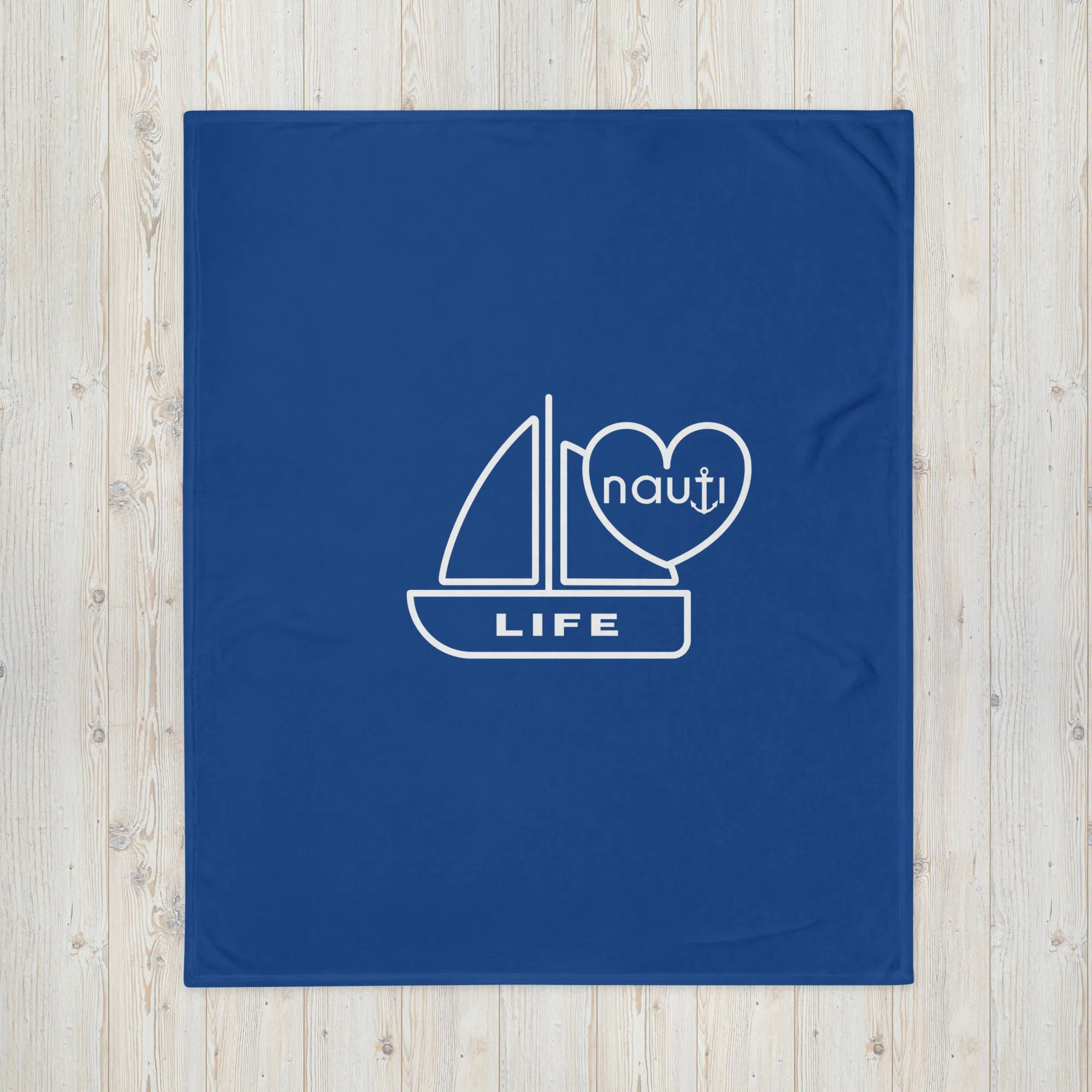 "NAUTI" boat life blanket in navy with white logo